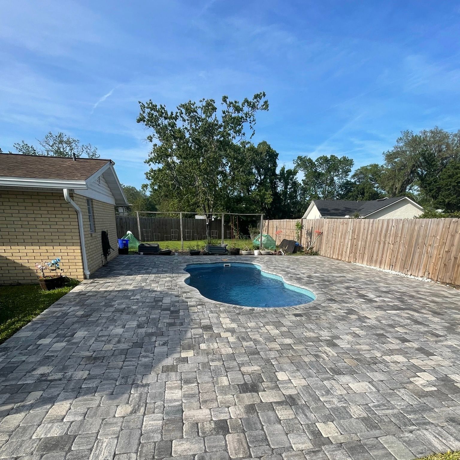 Man Deep Cleaning The Sidewalk — Jacksonville, FL — Express Soft and Pressure Wash Man Deep Cleaning The Sidewalk — Jacksonville, FL — Express Soft and Pressure Wash