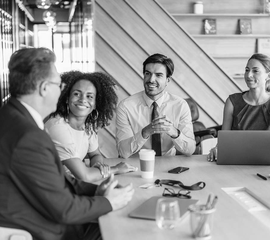 Clients meeting and discussing the services the Social Intelligence Group provides.