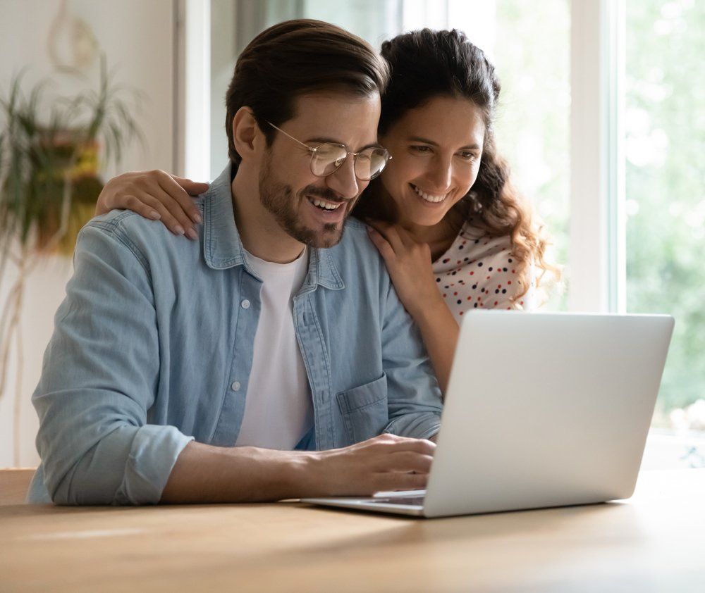 Couple Scheduling their Financial Appointment