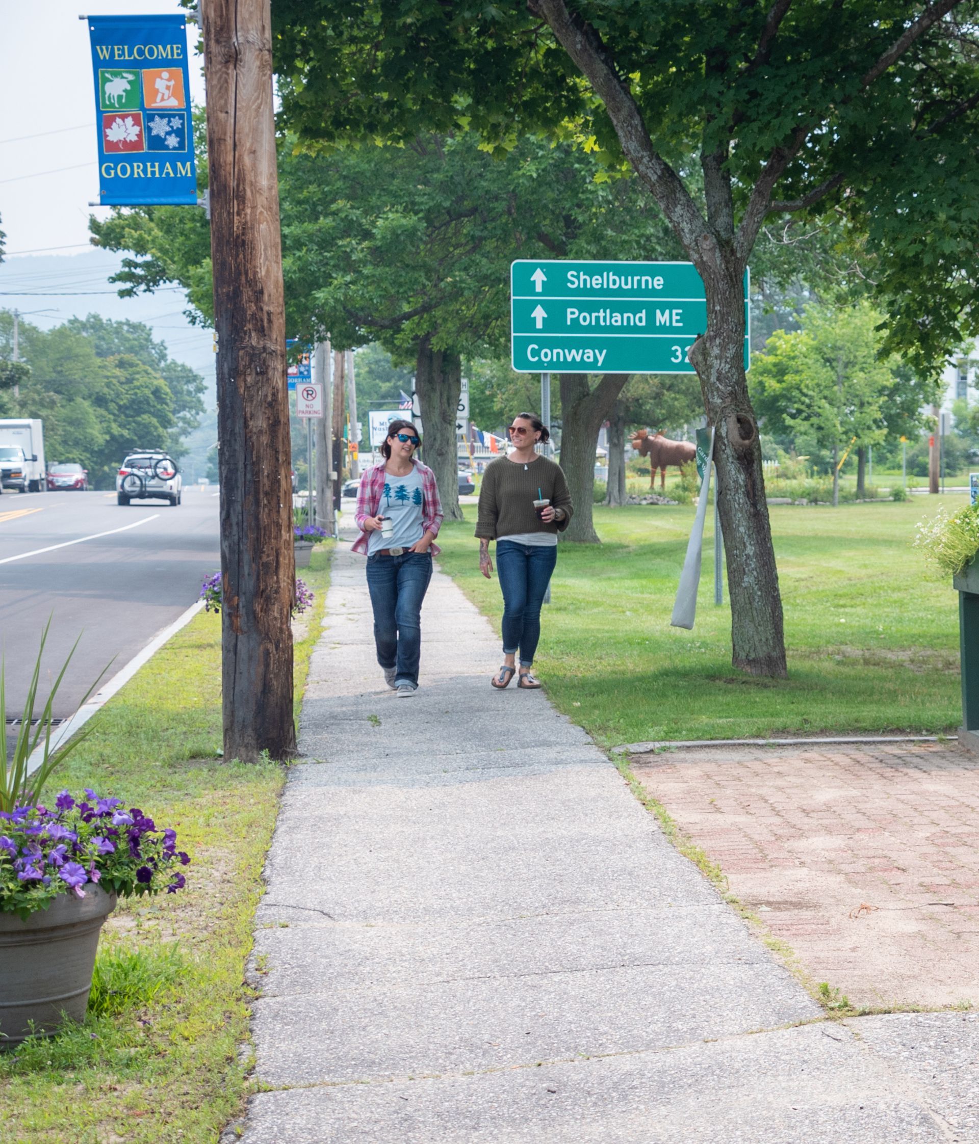 people walking on the sidewalk in Gorham