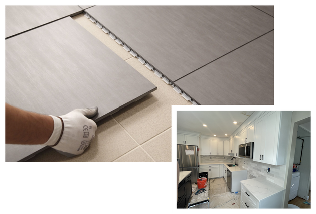 Installing gray tiles on a floor, kitchen remodel in progress.