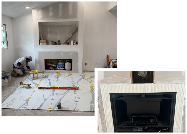 Tiling a fireplace and hearth; worker applies grout. Completed fireplace has a black interior. White marble-like tile.