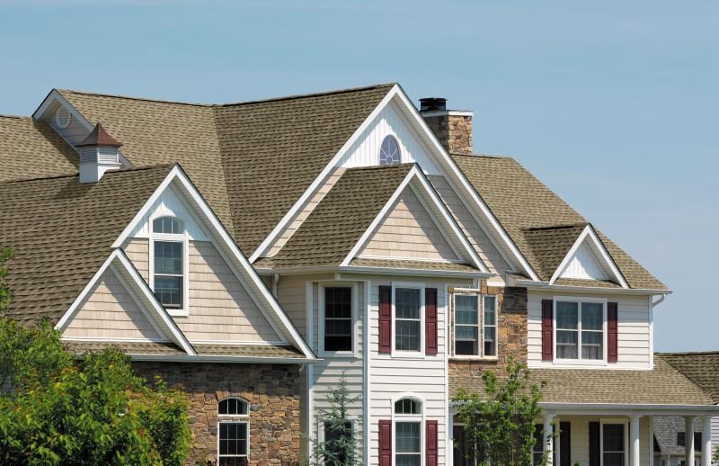 PREMIUM VINYL SIDING AND SHAKES