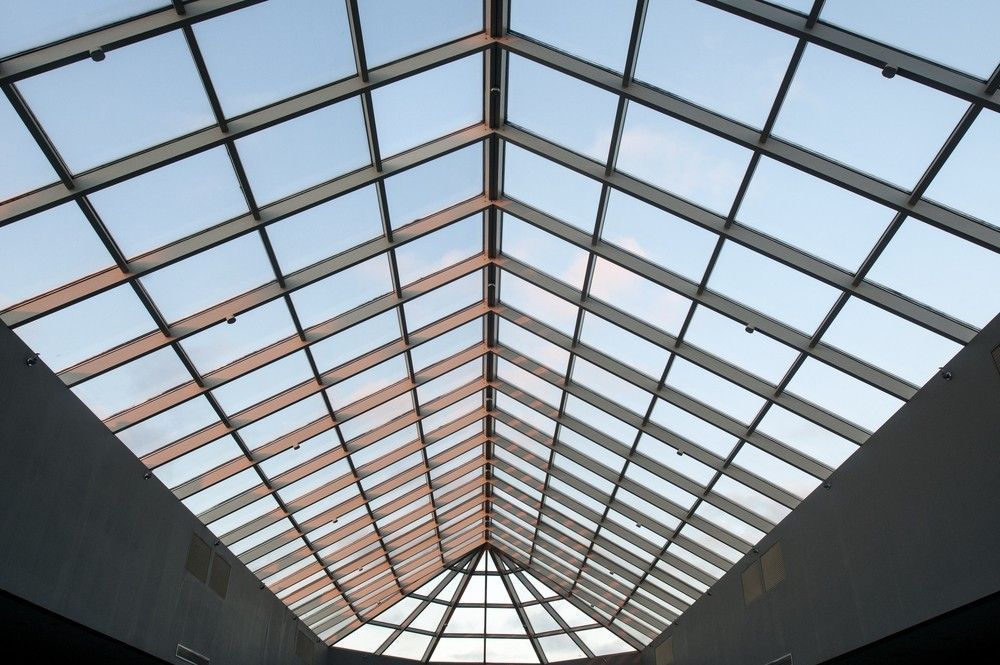 Looking Up At A Skylight With A Blue Sky In The Background — Northern Glazing Glass & Aluminium In Smithfield, QLD