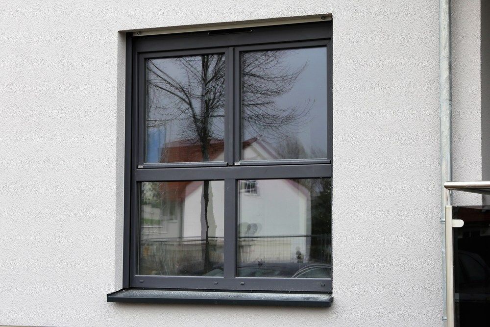 A Window On The Side Of A Building — Northern Glazing Glass & Aluminium In Smithfield, QLD