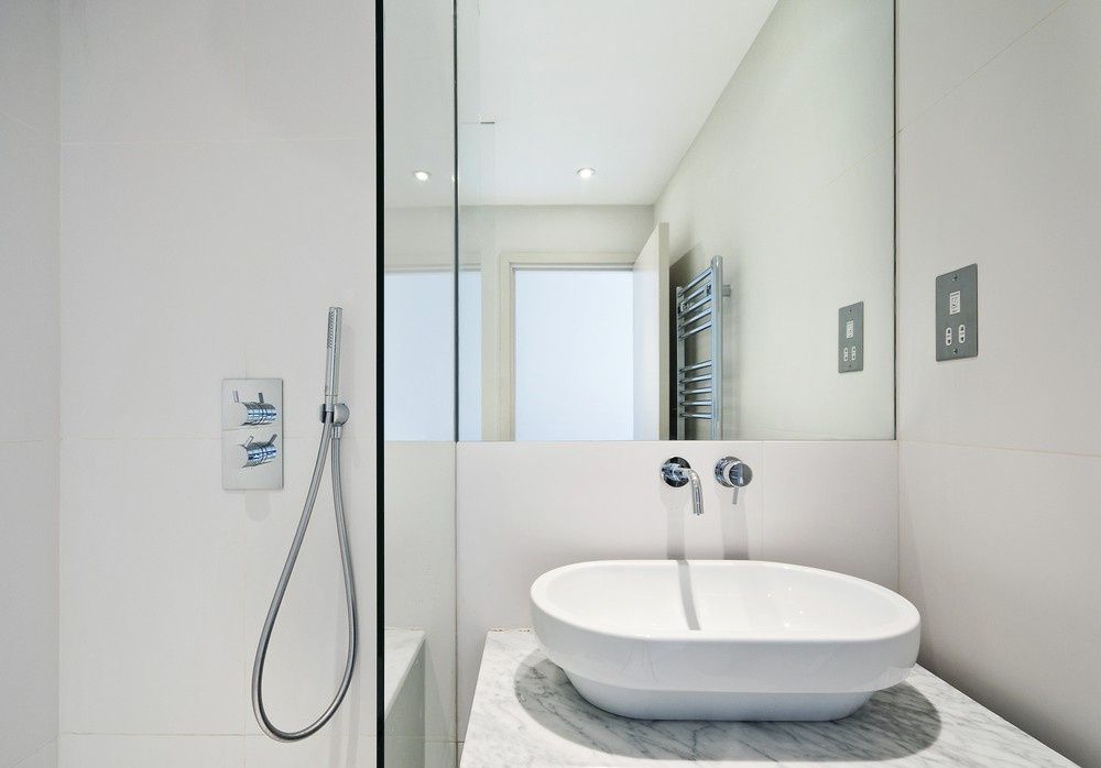 A Bathroom With A Sink, Shower And Mirror — Northern Glazing Glass & Aluminium In Smithfield, QLD