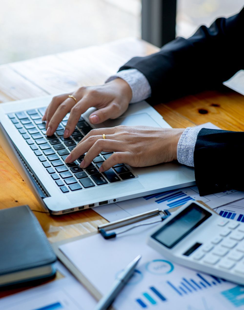 Accountant Using Laptop — Castle Hill, NSW — PMK Partners Accountant Using Laptop — Castle Hill, NSW — PMK Partners