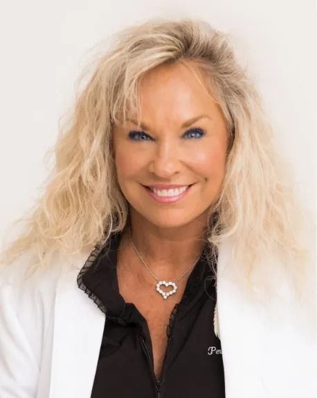 Professional portrait of Trinkette Parker Licensed Cosmetologist Master Technician and Instructor