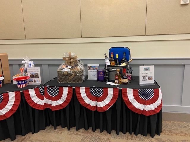 A table with red white and blue bunting on it