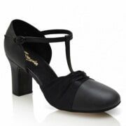 A pair of black shoes with a t strap on a white background.