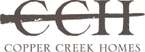 Copper creek homes logo on a white background