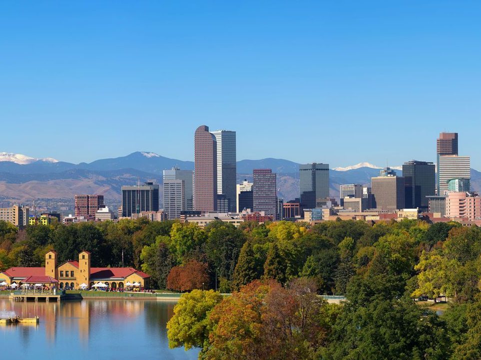 Photo of city skyline and river