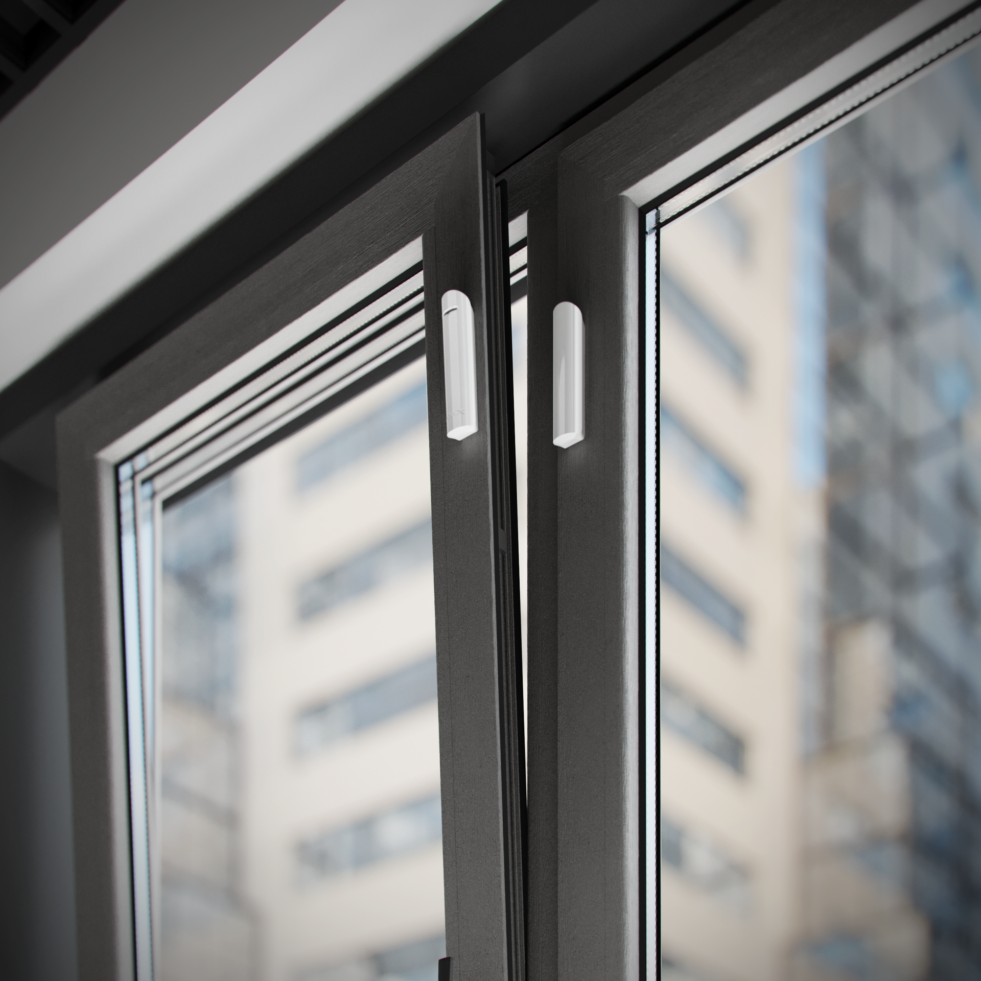 Wireless Ajax Systems door and window sensors installed on modern glass frames for enhanced intrusion detection in a smart home security setup.