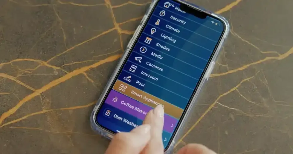Smartphone displaying a smart home app interface. A finger taps 
