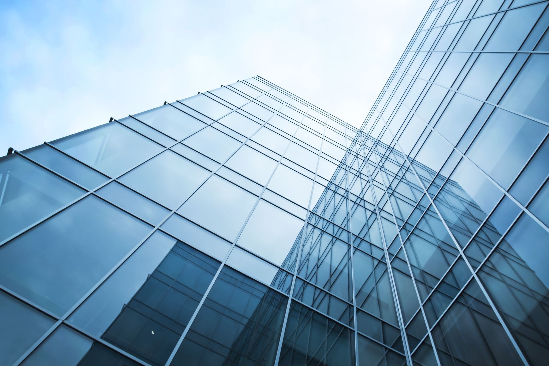 Commercial glass storefront installation on a modern office building. Commercial glass storefront installation on a modern office building.