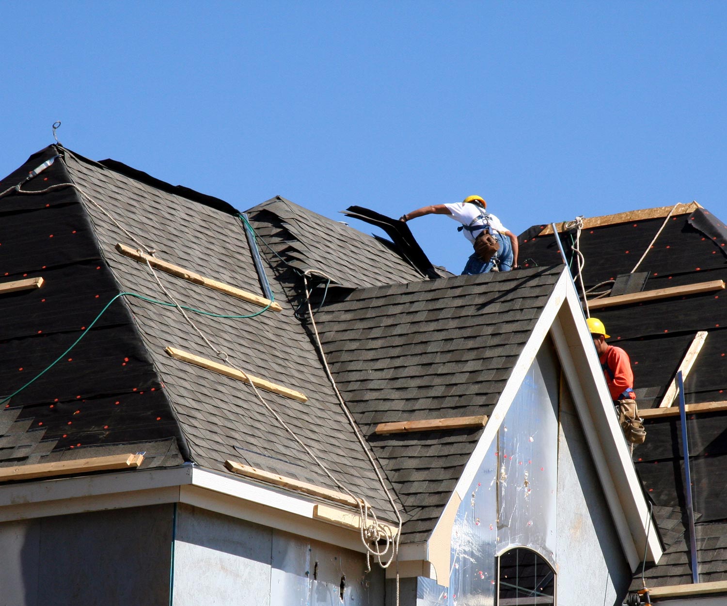 Workers On Roof — Grimes, IA — Top Gun Contractors of Grimes Workers On Roof — Grimes, IA — Top Gun Contractors of Grimes