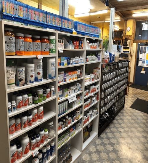 Nature's Kitchen supplement and vitamin store, stocked shelves.