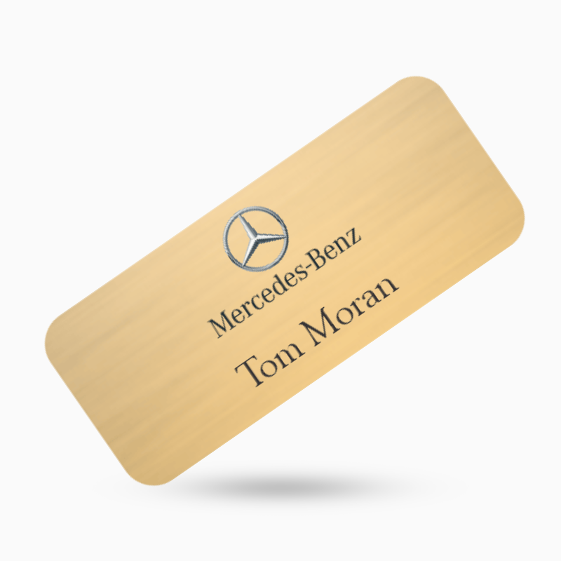 gold car dealership name tag