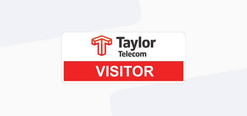 white event name tag with red box highlighting Visitor