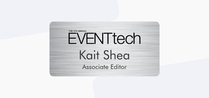 silver metal event name tag