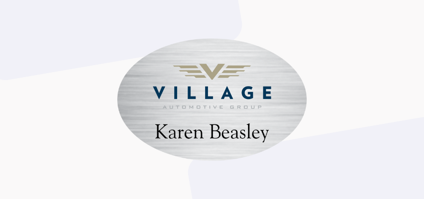 silver metal oval name tag