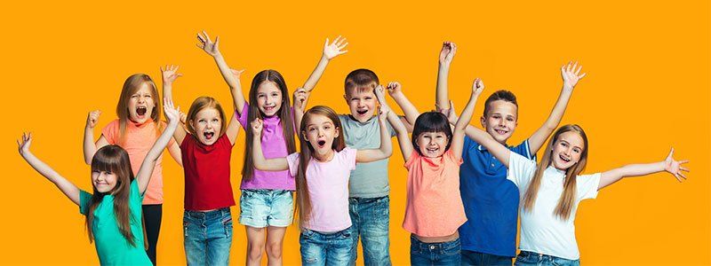 Happy kids with orange background