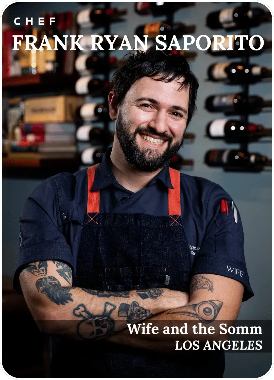 Chef Frank Ryan Saporito smiling in a black apron, standing in a wine cellar with “Wife and the Somm” text.