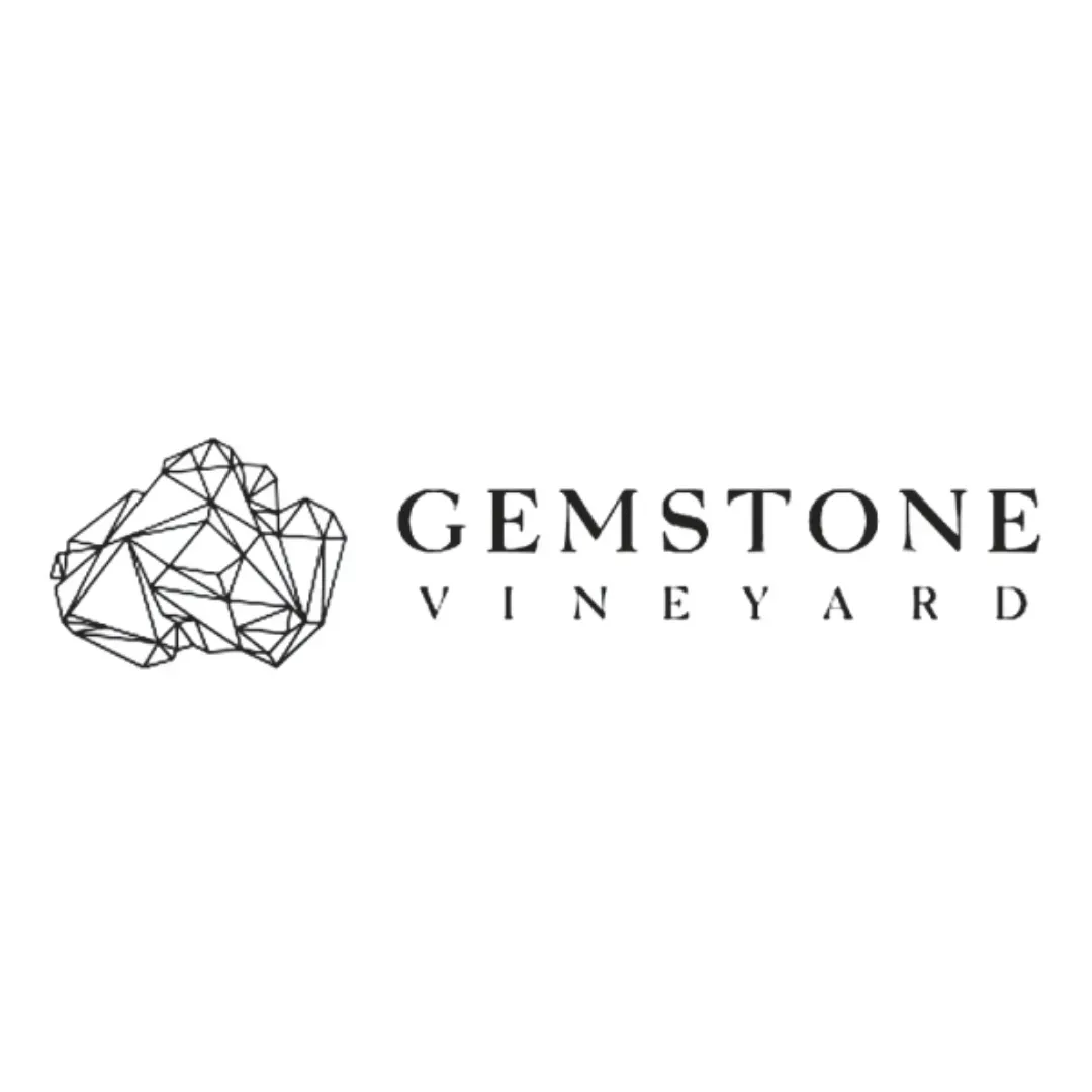 Black geometric gem logo with the words “GEMSTONE VINEYARD” in serif text