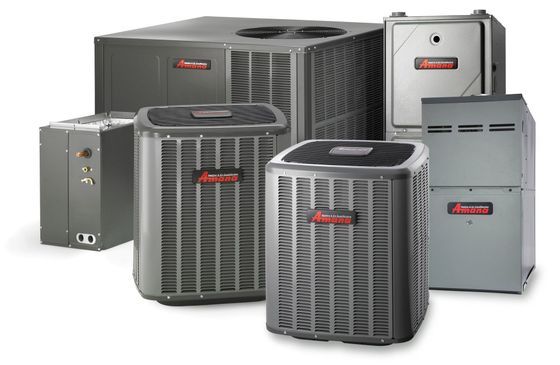 A group of air conditioners are sitting next to each other on a white background.
