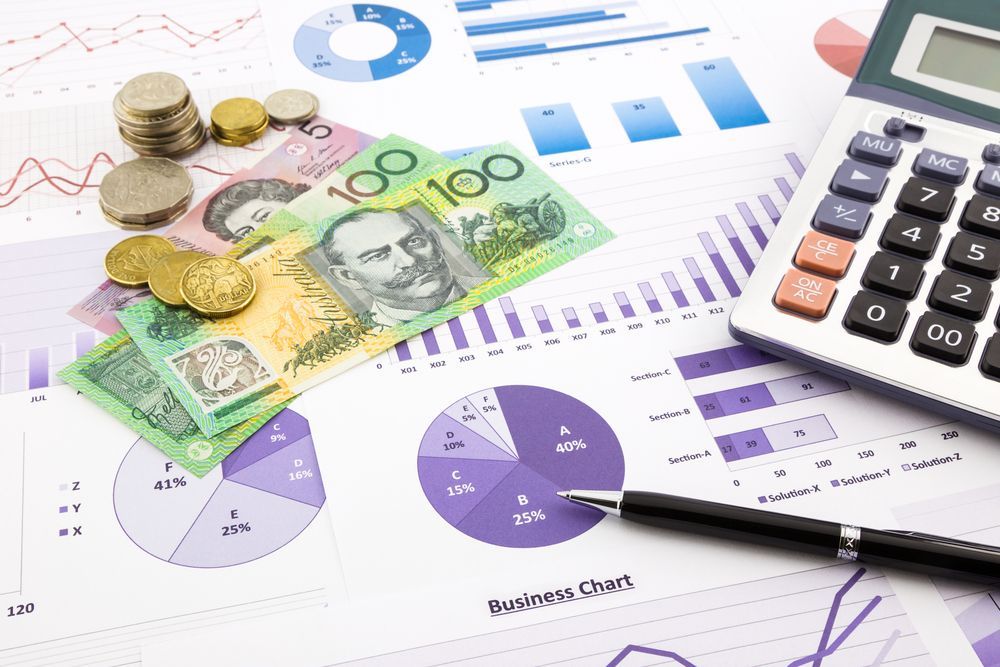 Financial Documents With Australian Currency, Calculator, and Pen — Accountsloop Tax & Business Advisory in Geelong, VIC