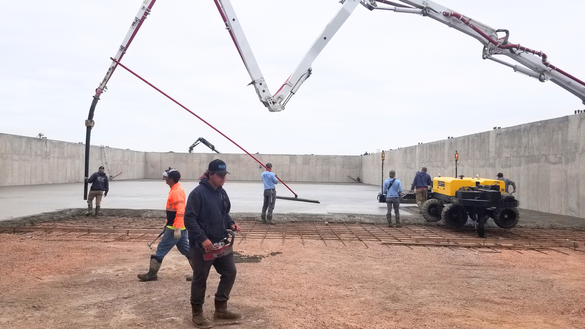 Freshly poured concrete driveway in Casper, Wyoming with mountain ridgeline in the background