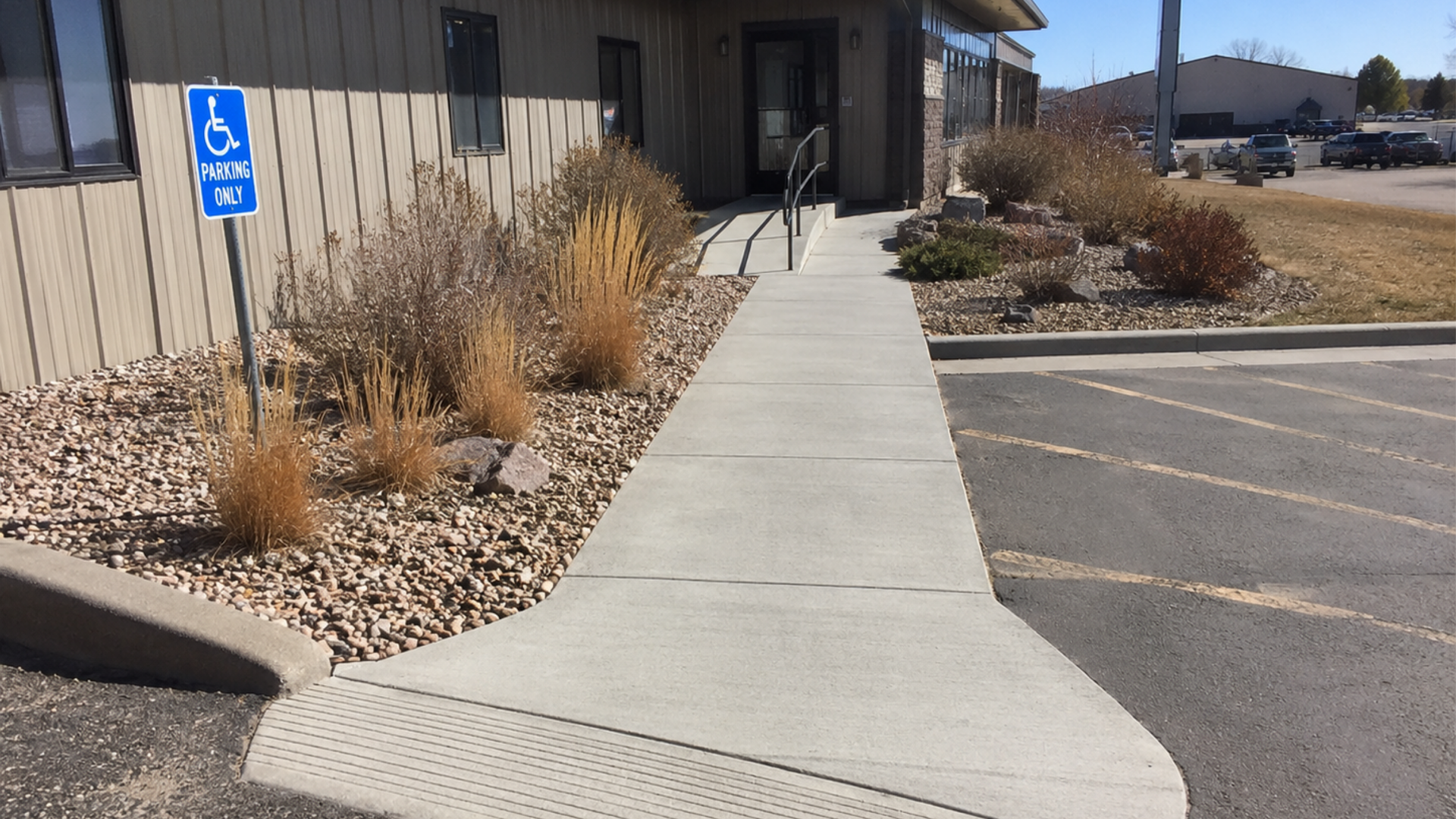 Accessible concrete sidewalk leading to a commercial property in Casper Wyoming