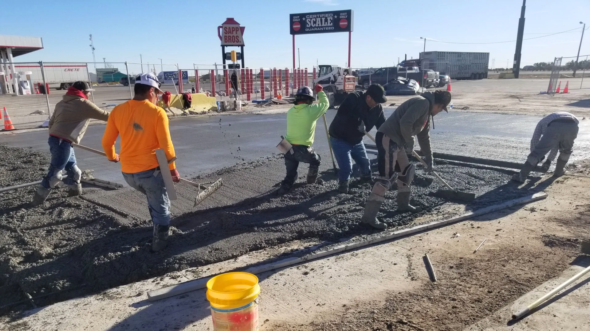 Wide shot of an active concrete jobsite in a Casper residential neighborhood