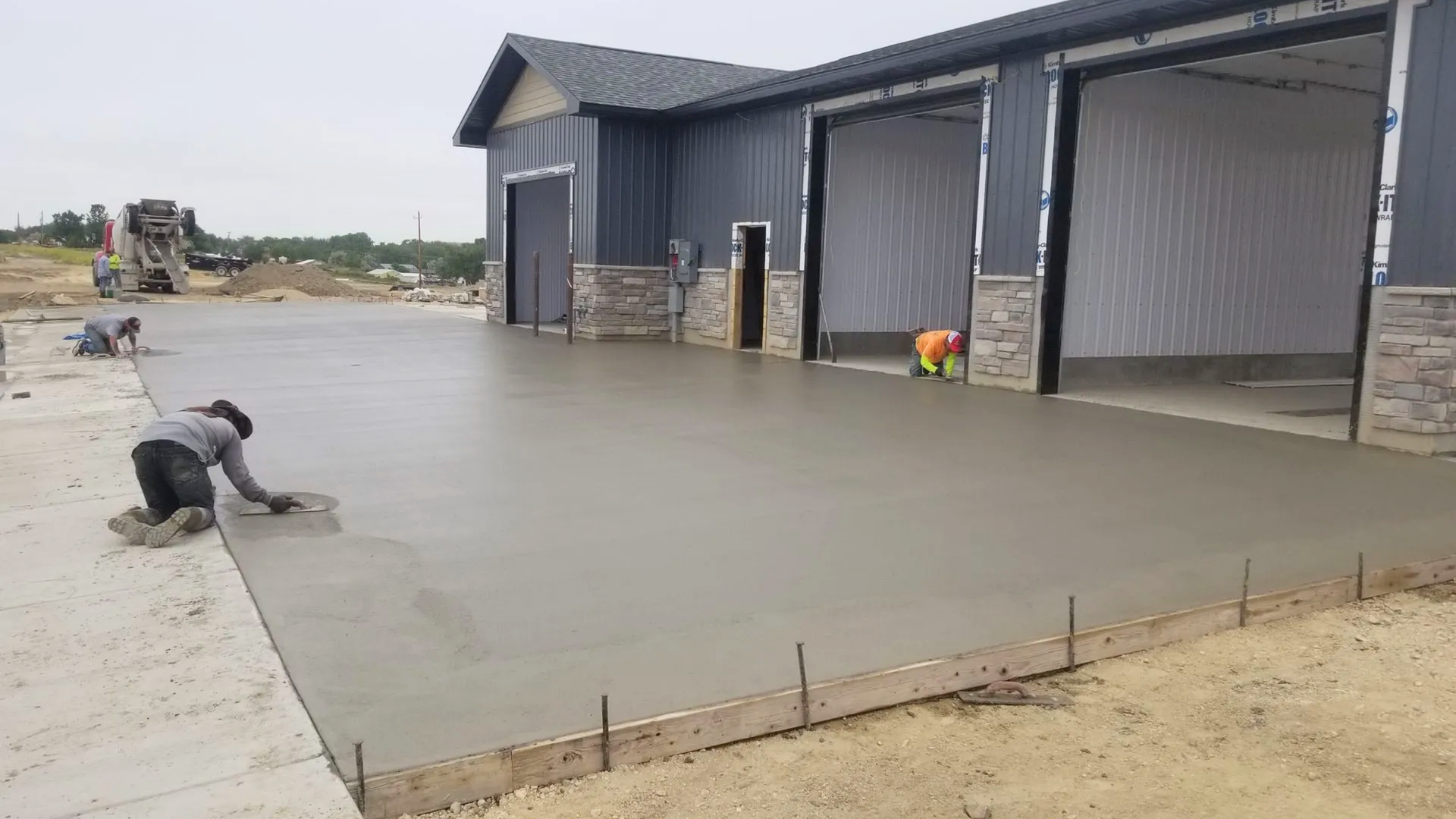 Winter concrete pour in Casper, Wyoming protected by insulating blankets and heated enclosure under 