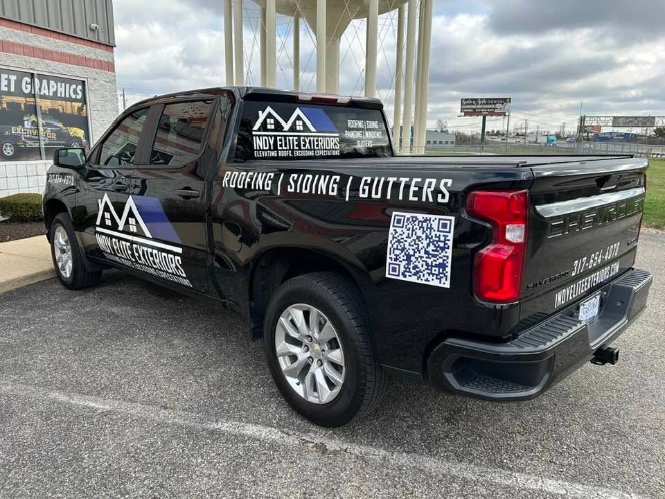 Black pickup truck that says