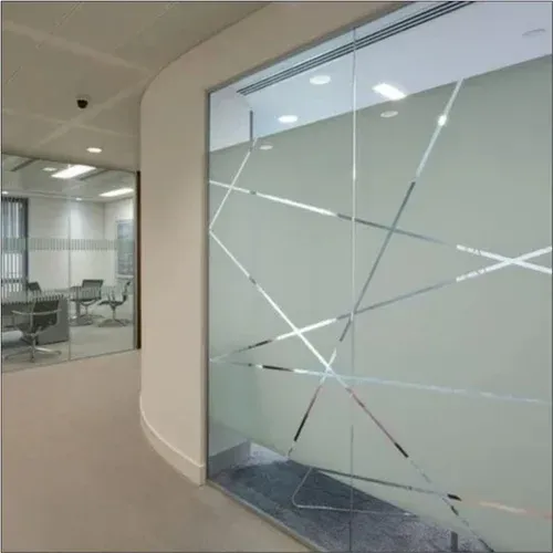 A glass wall with a geometric design on it