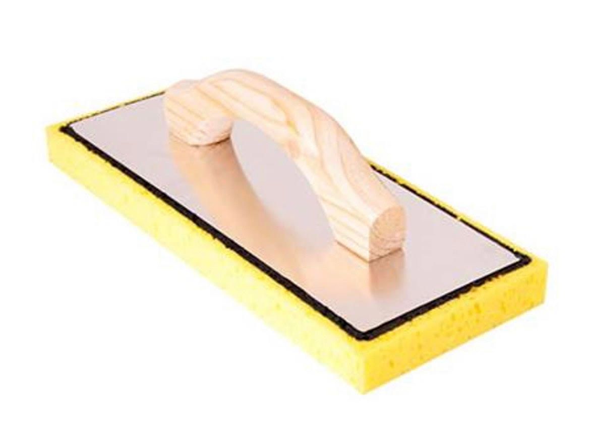 A yellow sponge with a wooden handle on a white background