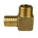 A close up of a brass elbow on a white background.