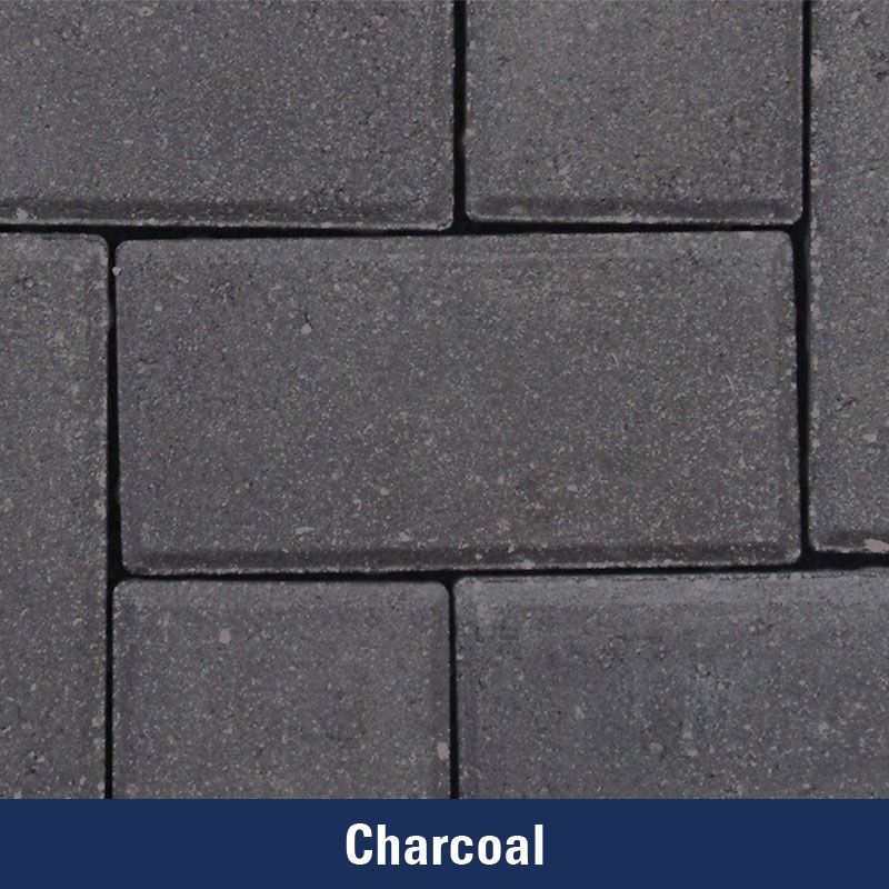A close up of a charcoal colored brick wall