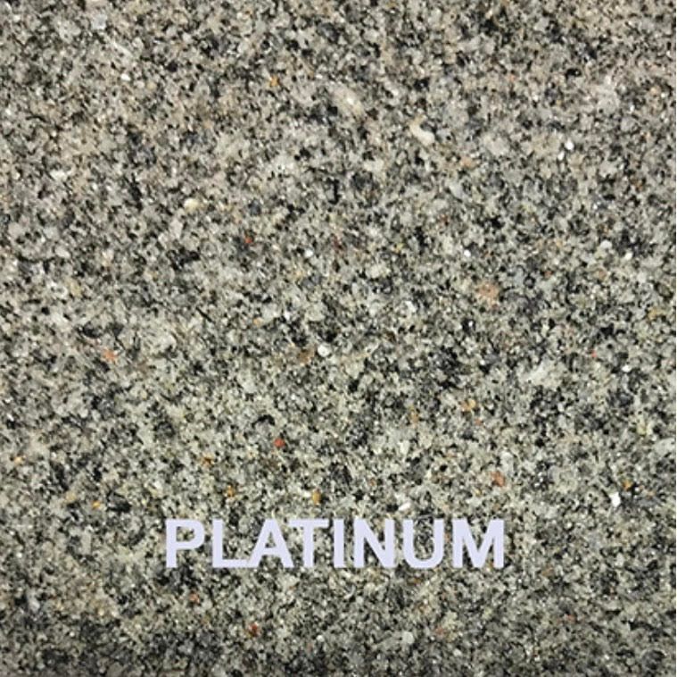 A close up of a platinum granite counter top