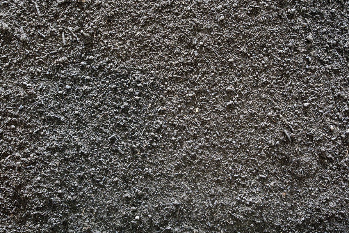 A close up of a black carpet texture.