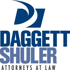 Daggett Shuler Attorneys at Law blue logo with stylized D and company name