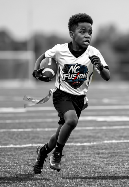 Flag football player running with a football on the field 