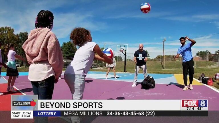 Volleyball players on an outdoor court during a Fox 8 “Beyond Sports” segment