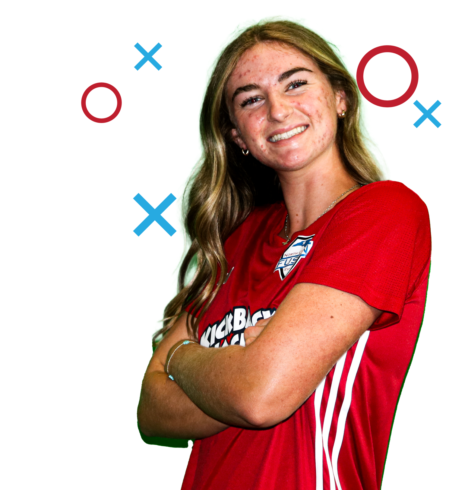 Smiling athlete in red jersey with crossed arms on white background with blue and red X and O symbols