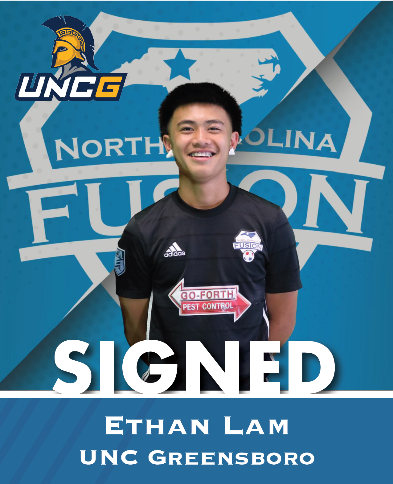 Ethan Lam smiles in a black UNCG jersey before a North Carolina Fusion backdrop with “SIGNED” text.