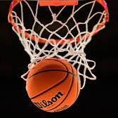 Basketball swishing through a white net on an orange hoop against a black background