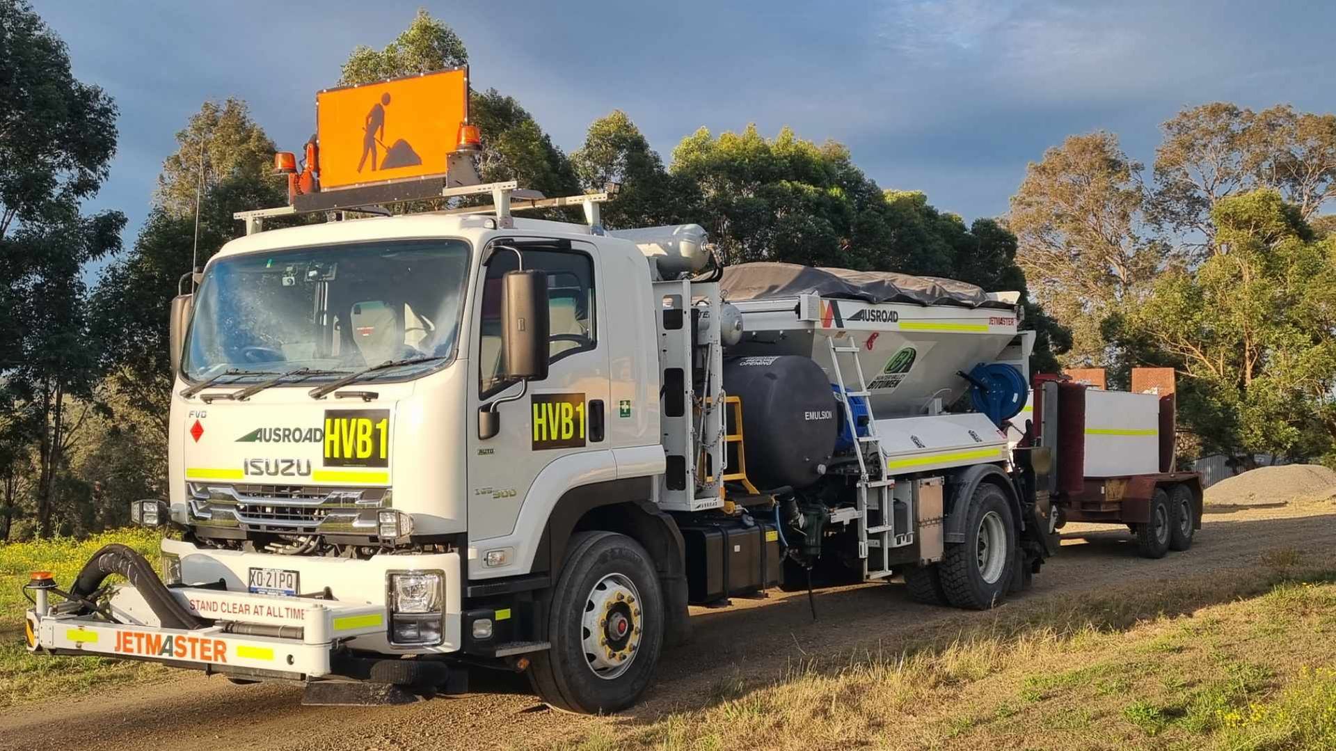 A Large Brick Building Is Sitting on Top of A Gravel Driveway — Hunter Valley Bitumen In Gresford, NSW
