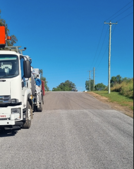 Bitumen sealing truck parked on a rural road ready for resurfacing – Hunter Valley Bitumen in Gresford, NSW.