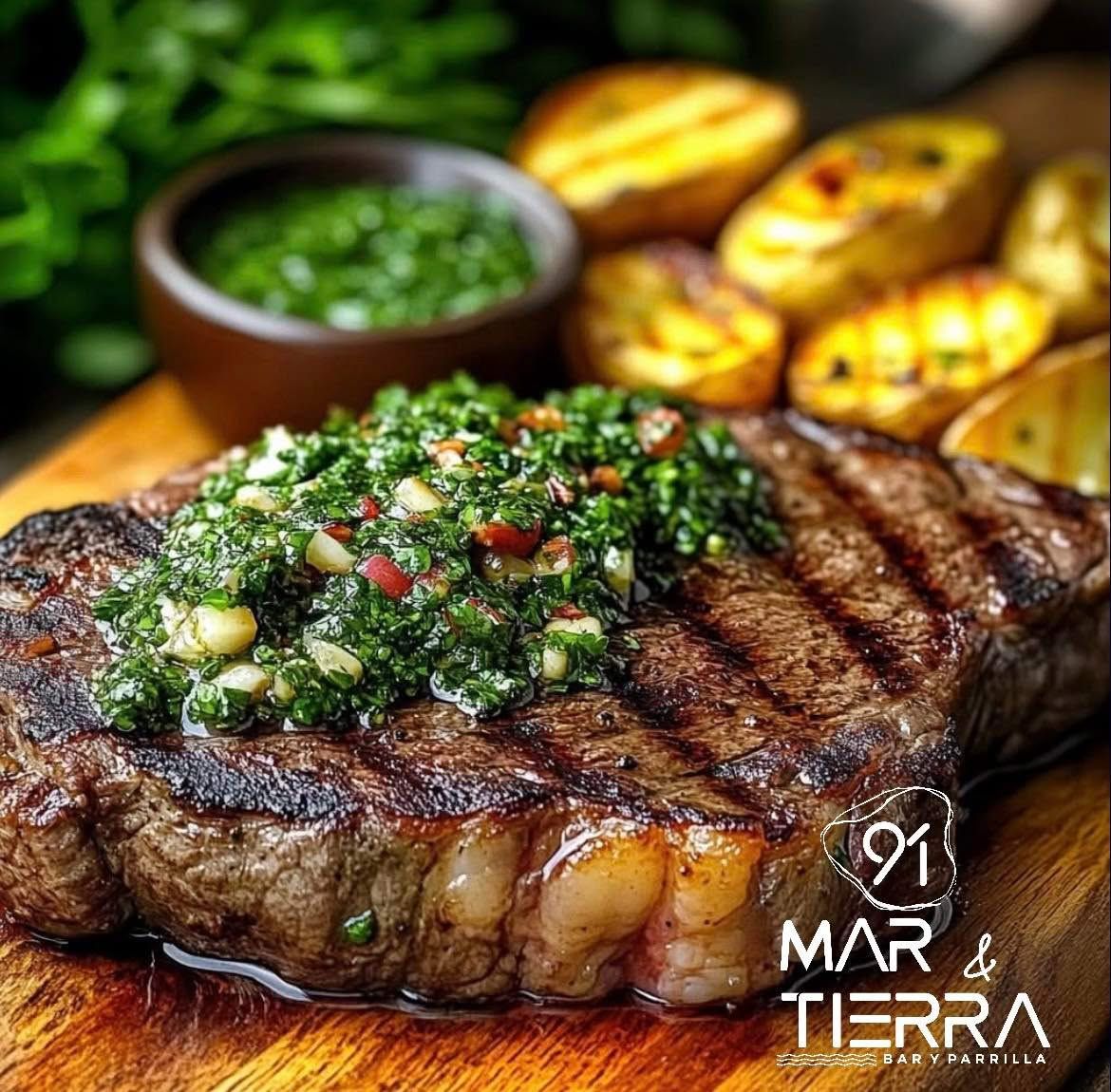 A steak is sitting on a wooden cutting board next to potatoes.